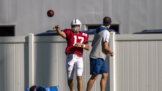 Indianapolis Colts quarterback Philip Rivers warms up before a recent practice in training camp. The 17th-year pro is in his first season with the Colts after 16 years with the Chargers.
